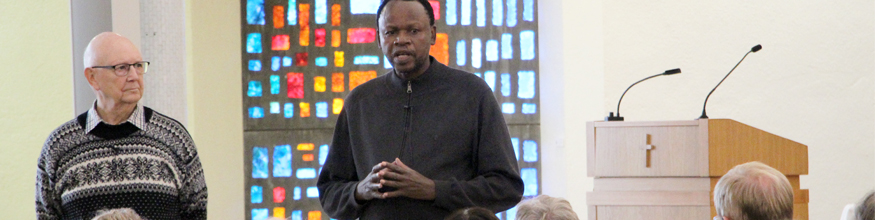 Person talking to audience in the Chapel